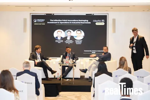 A panel moderated by Alexander Morari, seen over the audience at PropTech Connect Middle East 2026 in Dubai.